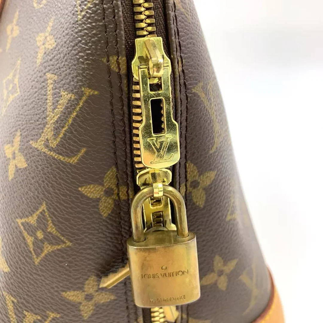 Louis Vuitton Alma Handbag