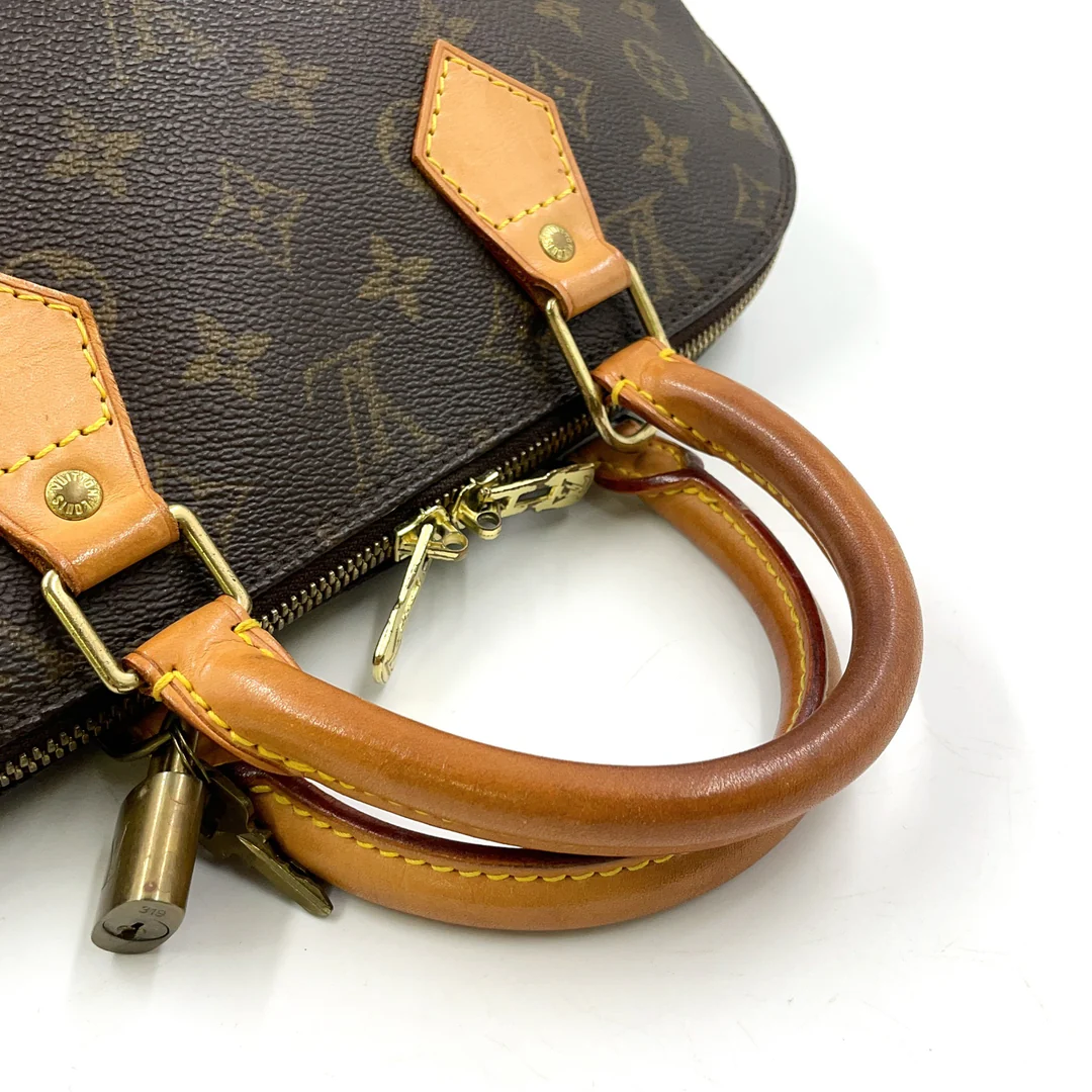 Louis Vuitton Alma Handbag
