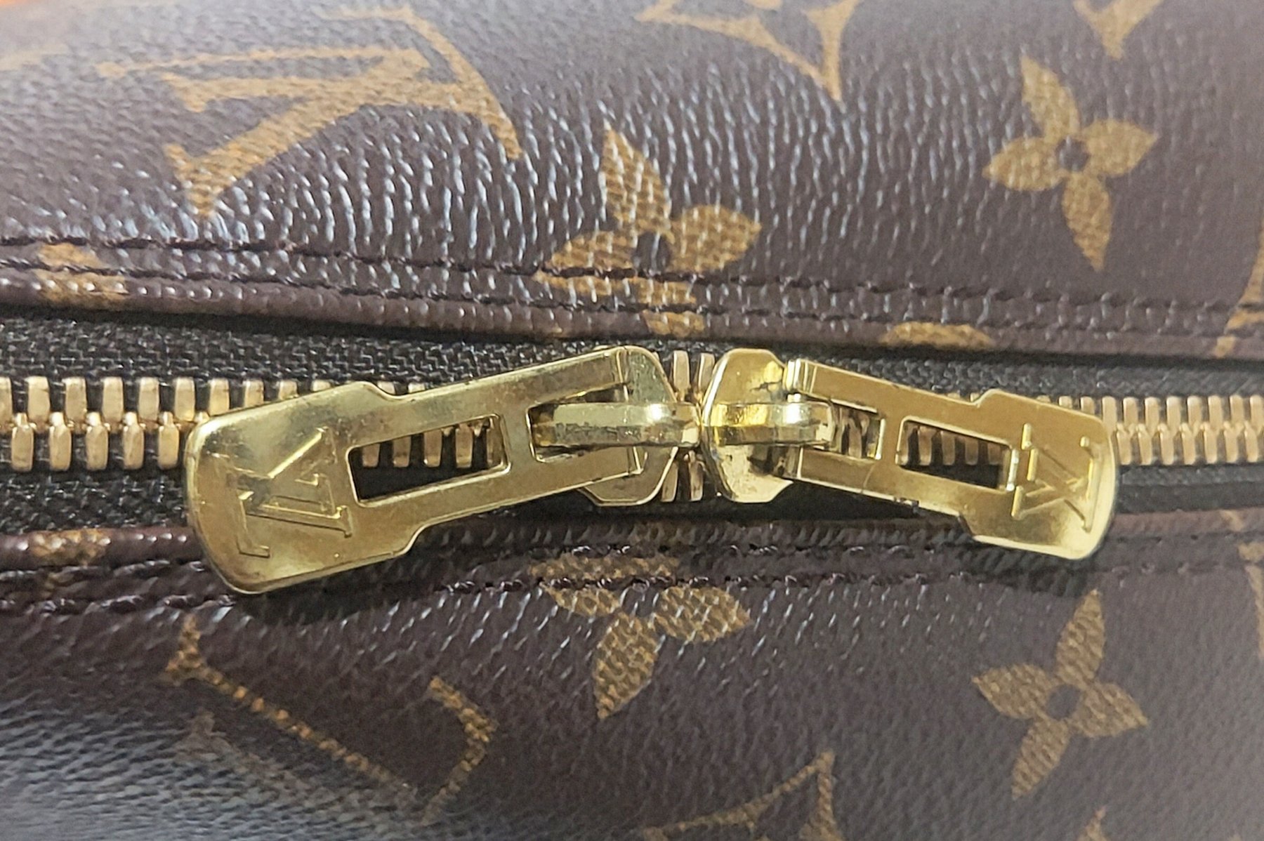 Louis Vuitton Alma Handbag