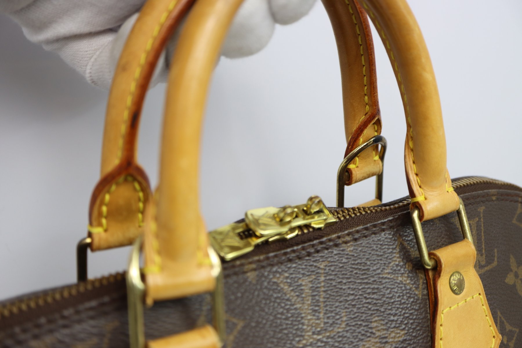 Louis Vuitton Canvas Monogram Alma Handbag