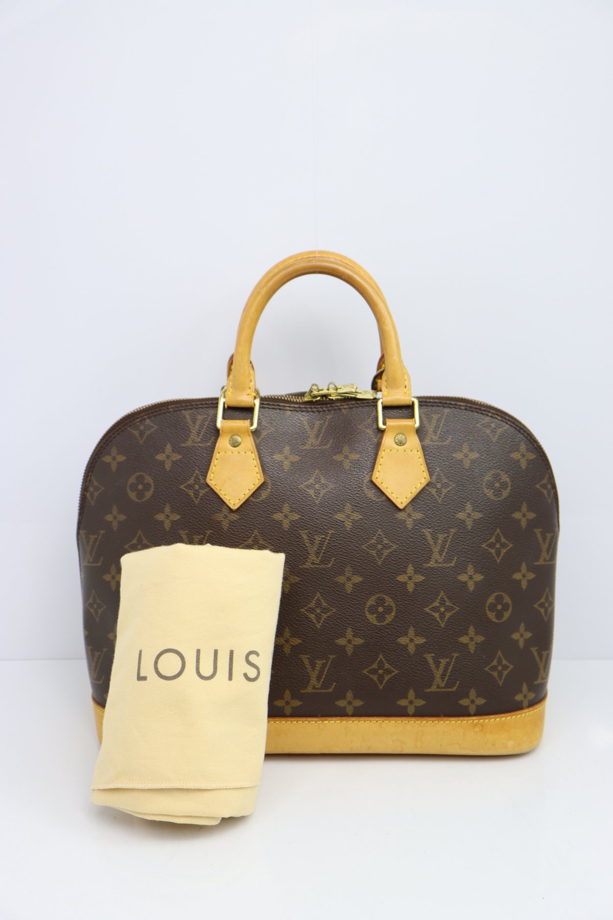 Louis Vuitton Canvas Monogram Alma Handbag