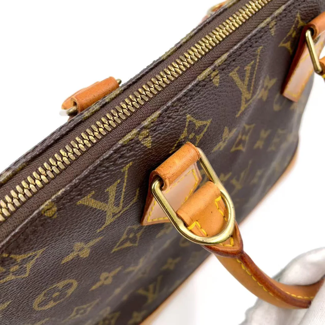Louis Vuitton Alma Handbag
