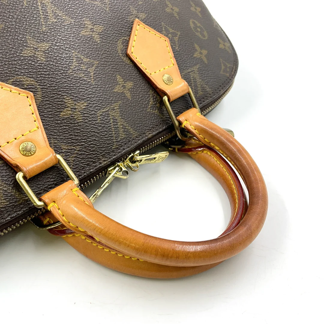Louis Vuitton Alma Handbag