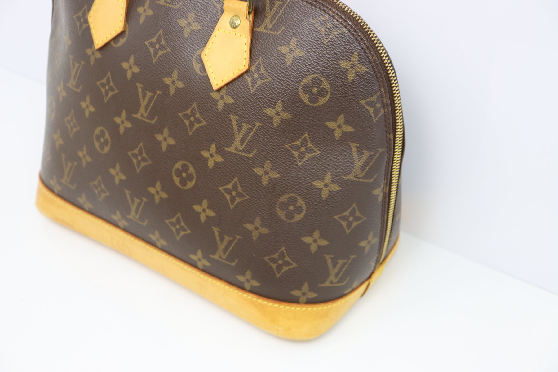 Louis Vuitton Canvas Monogram Alma Handbag