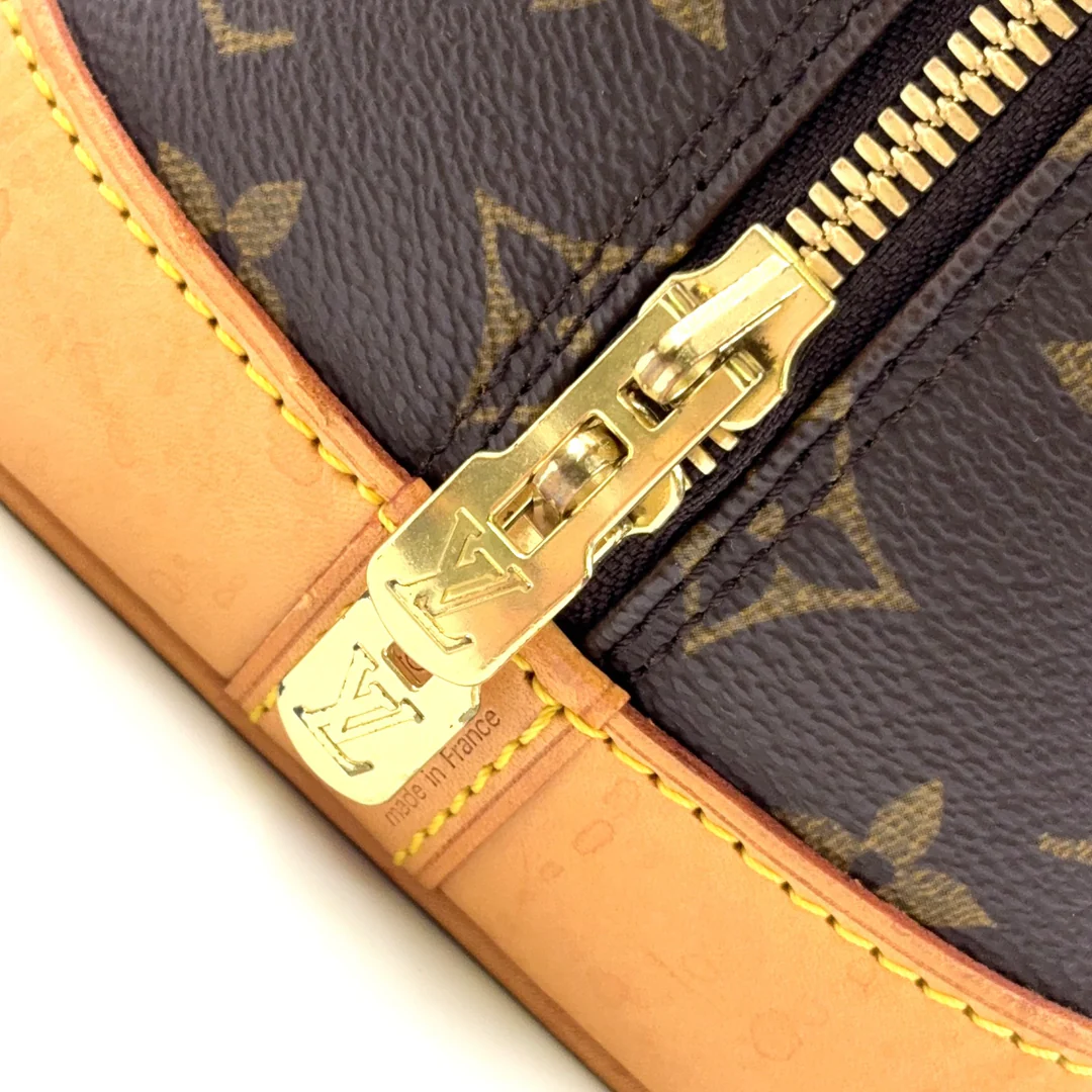 Louis Vuitton Alma Handbag