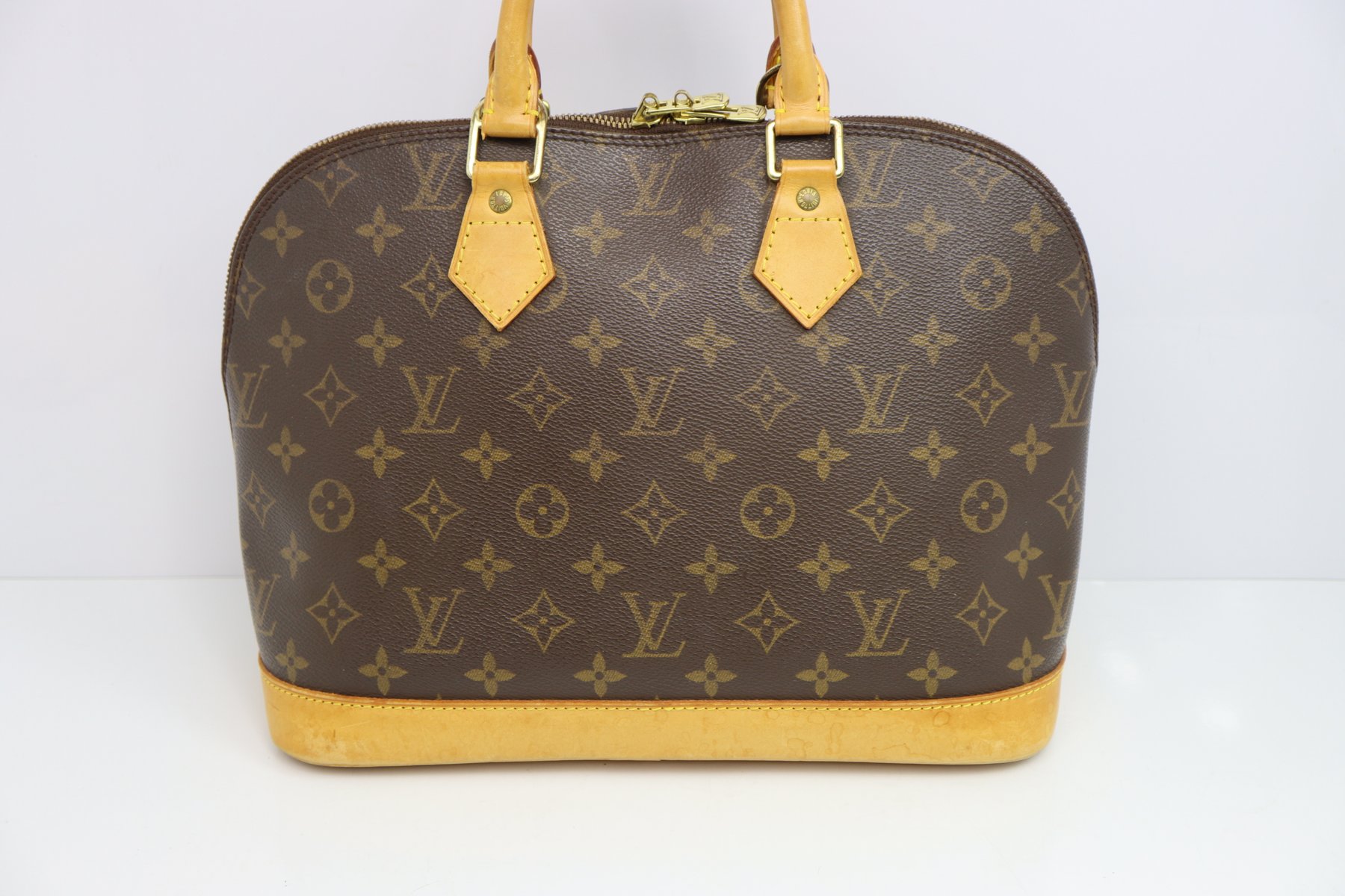 Louis Vuitton Canvas Monogram Alma Handbag