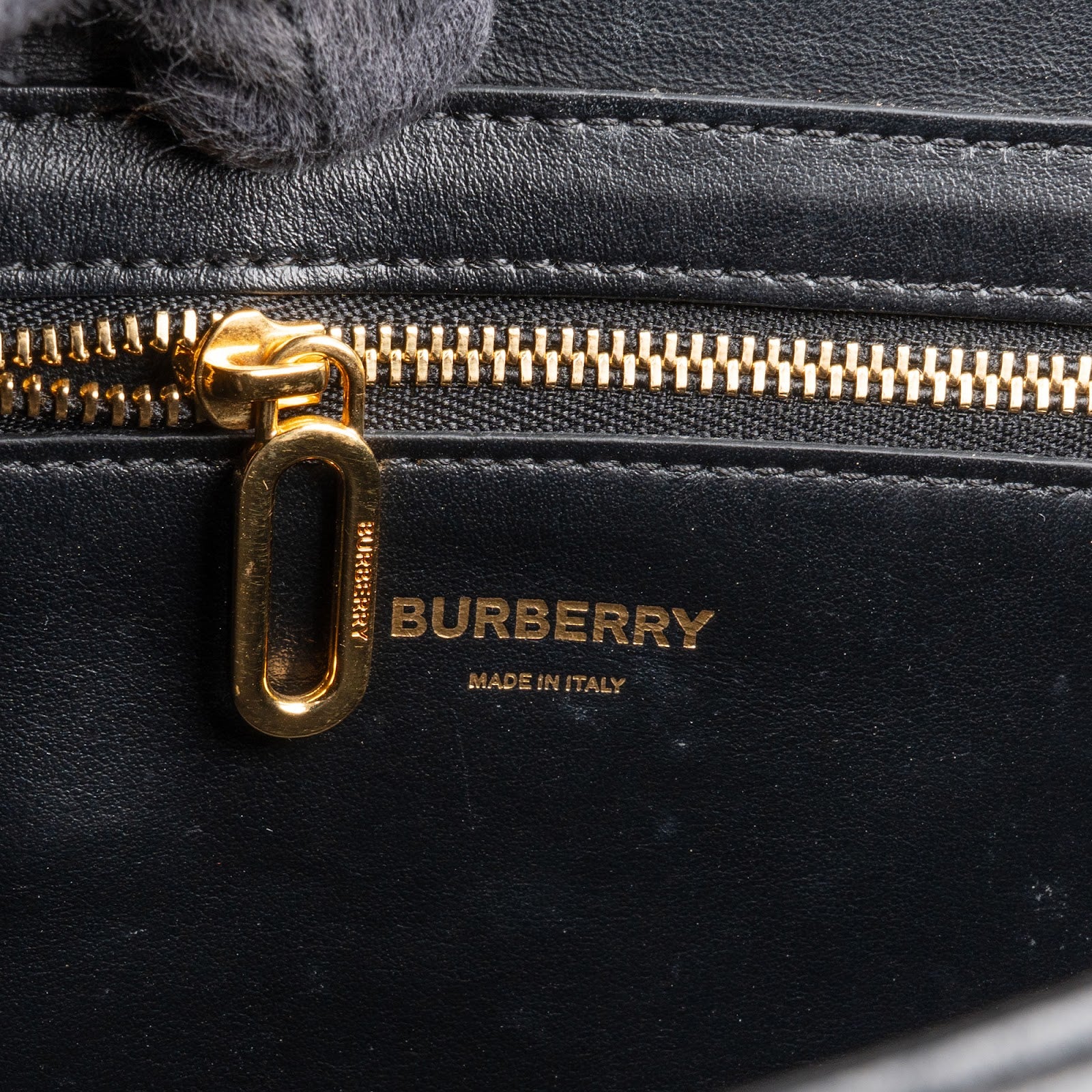 Burberry – Studded D-ring crossbody bag