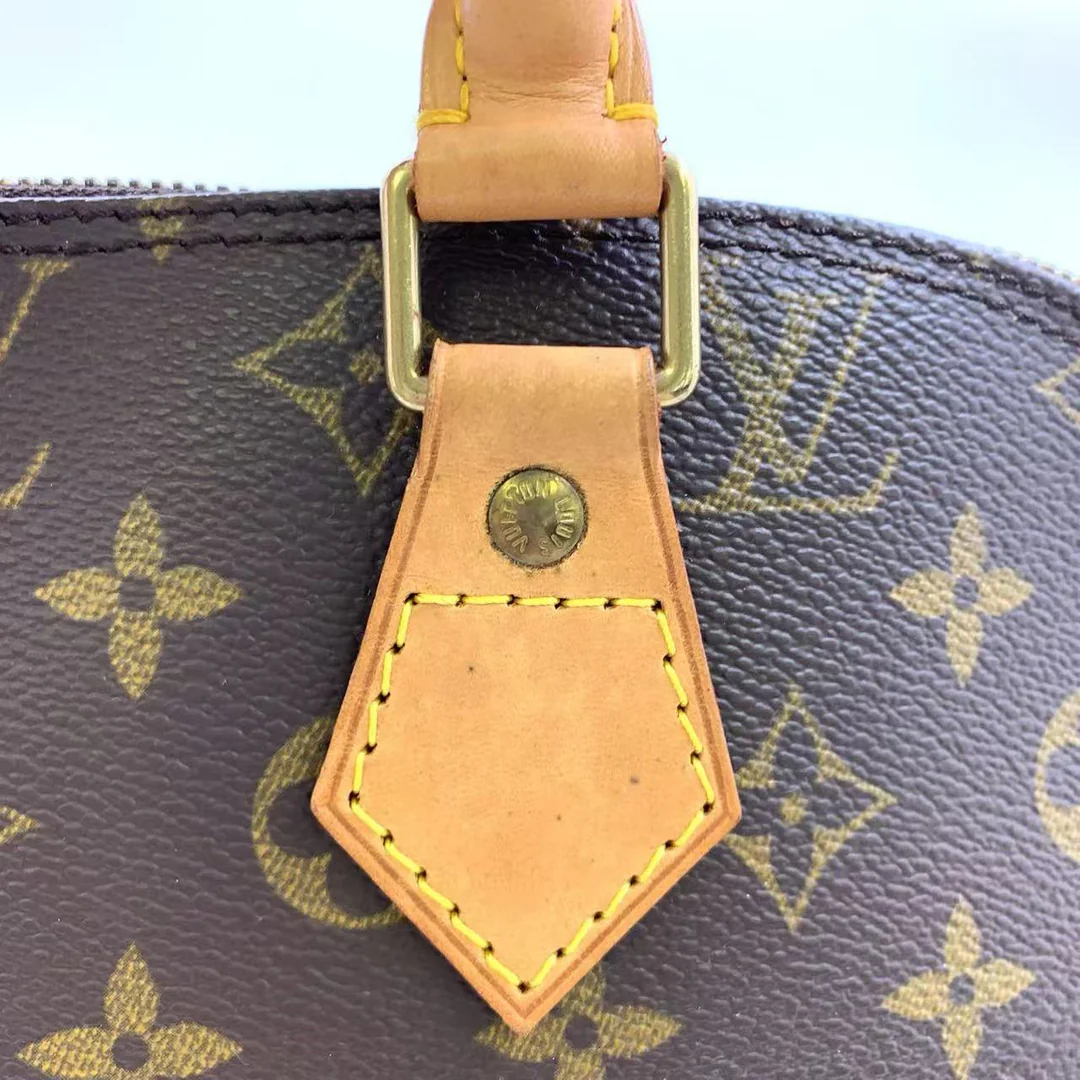 Louis Vuitton Alma Handbag
