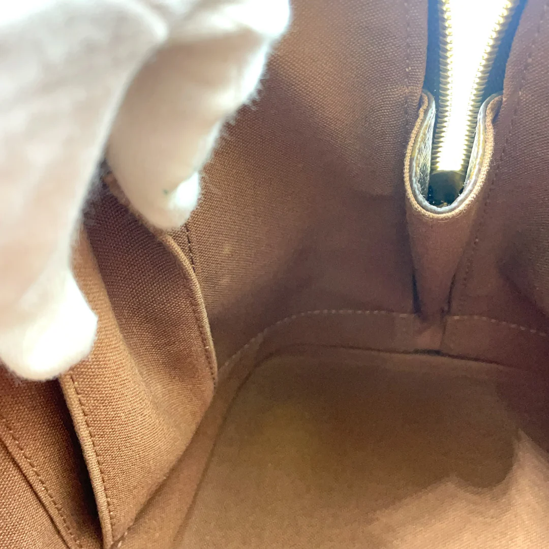 Louis Vuitton Alma Handbag