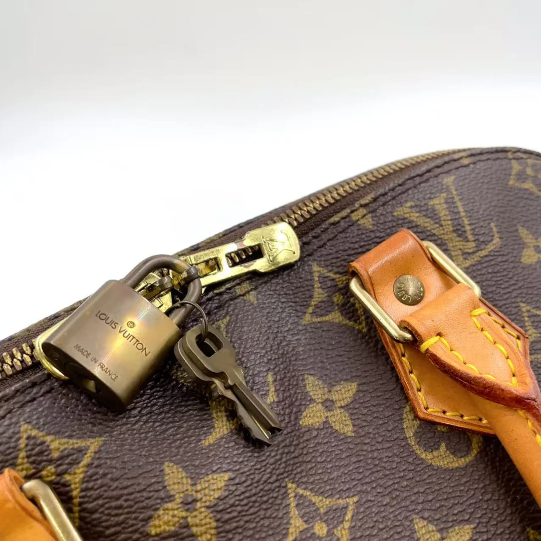 Louis Vuitton Alma Handbag