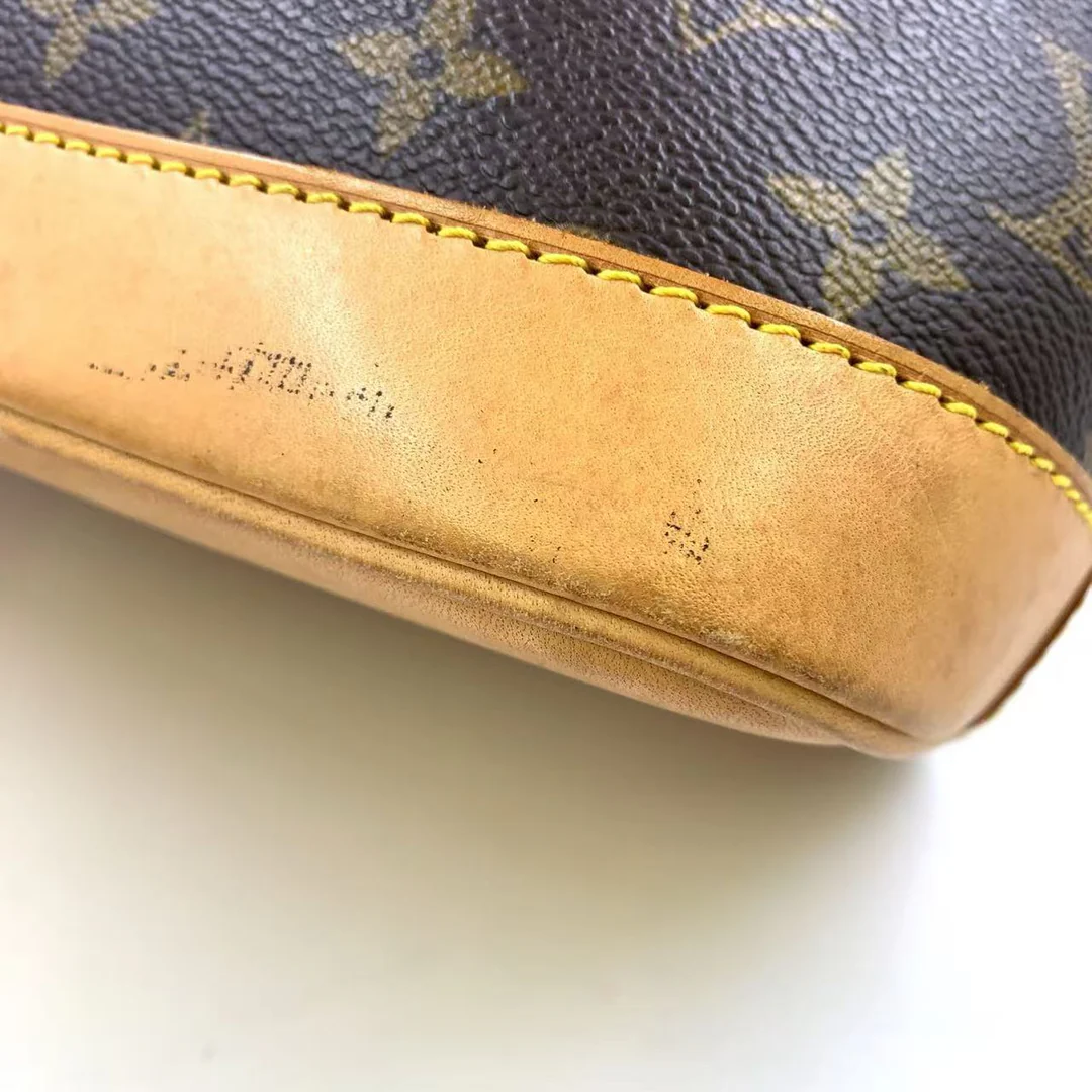 Louis Vuitton Alma Handbag