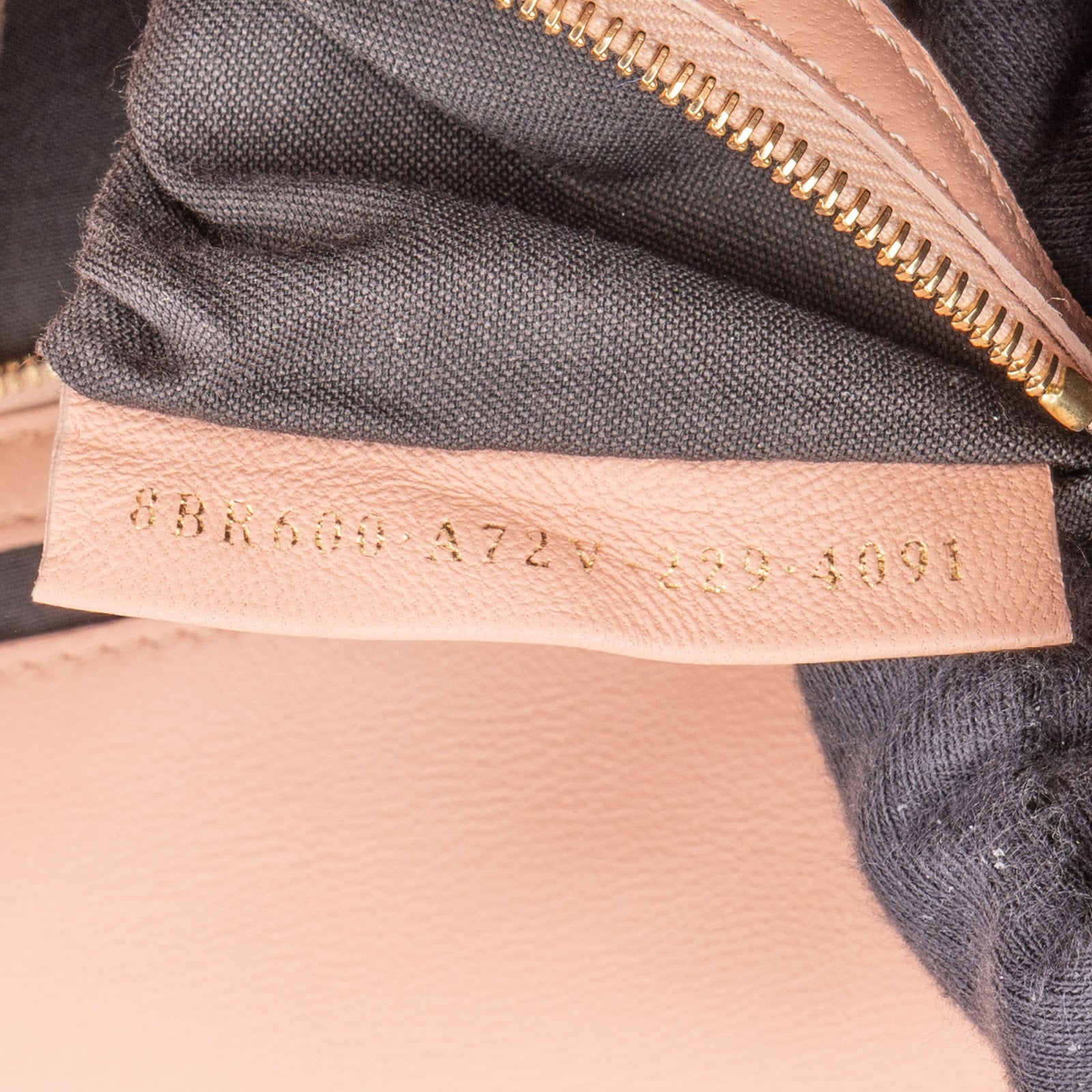 Fendi – Baguette Embossed Monogram FF Crossbody Bag