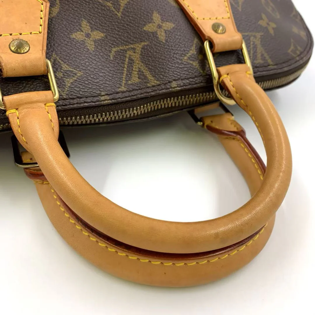 Louis Vuitton Alma Handbag