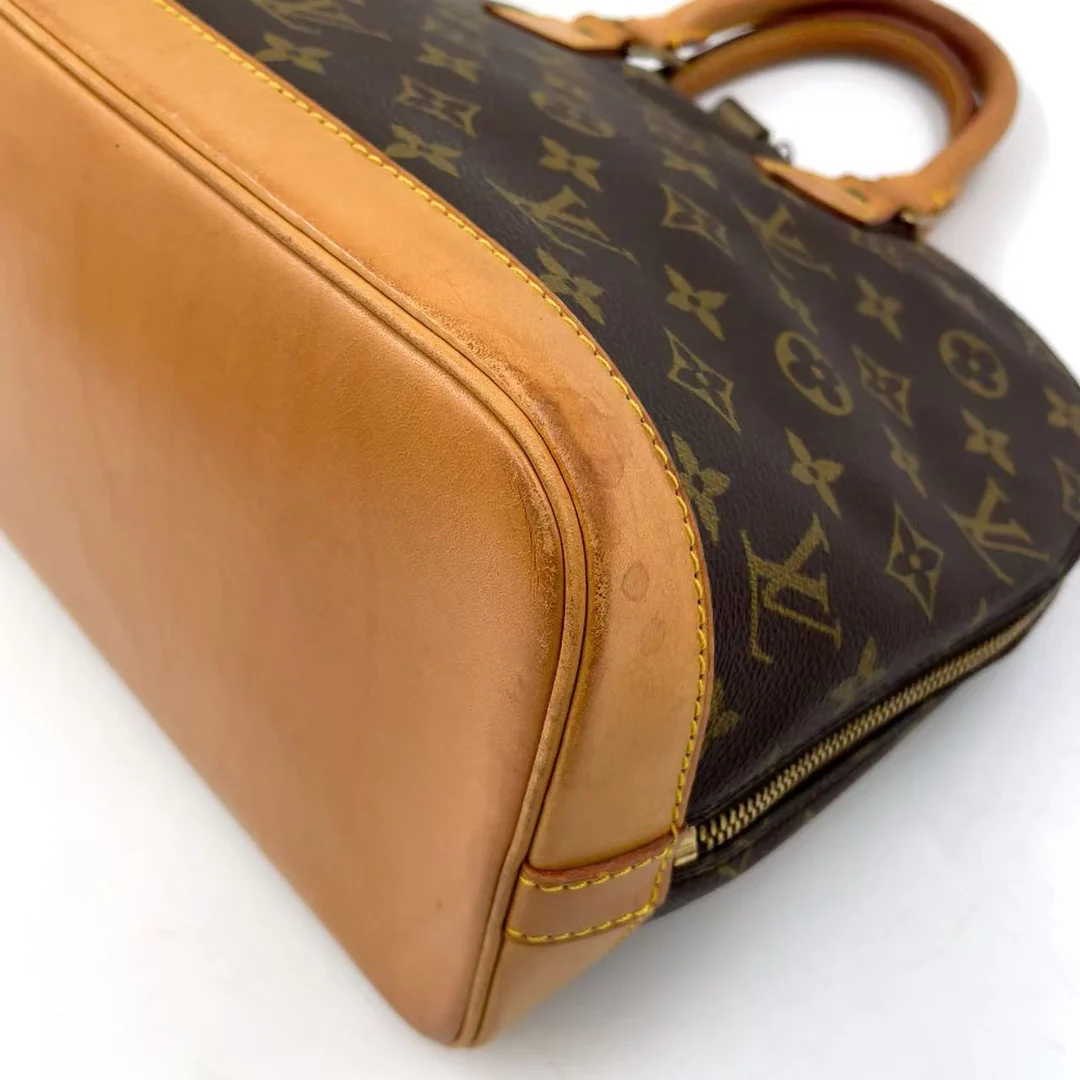 Louis Vuitton Alma Handbag