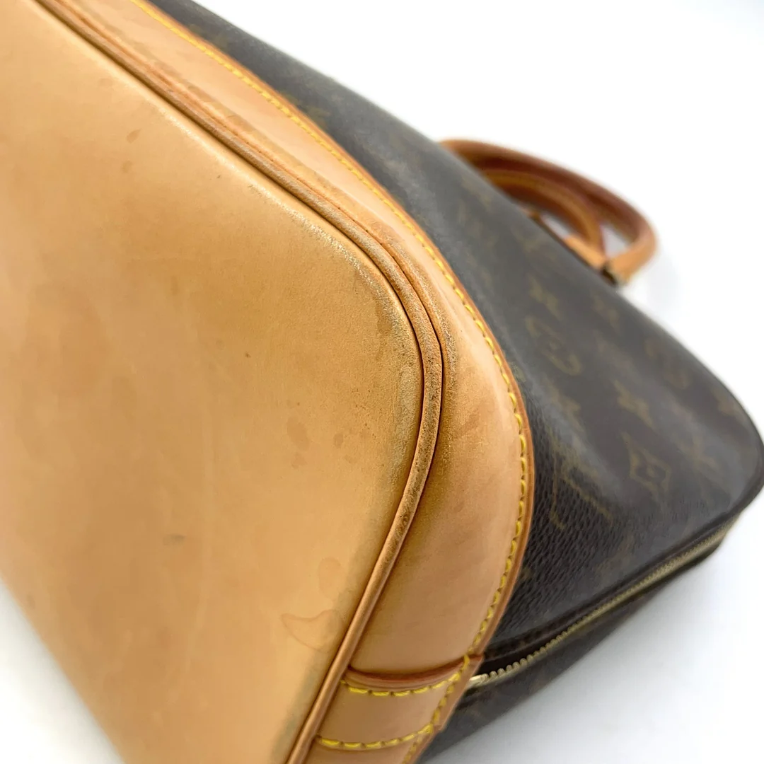 Louis Vuitton Alma Handbag