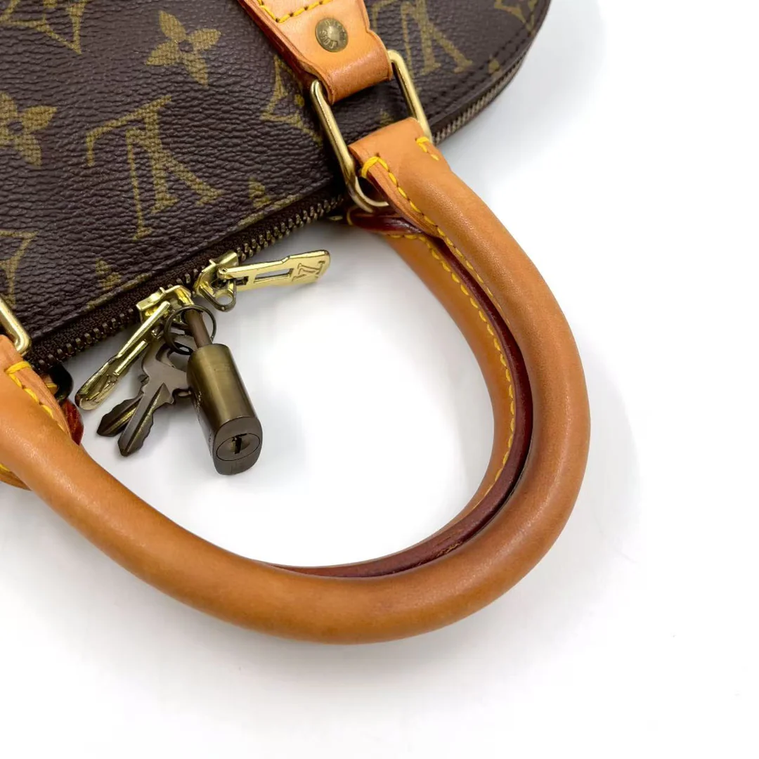 Louis Vuitton Alma Handbag
