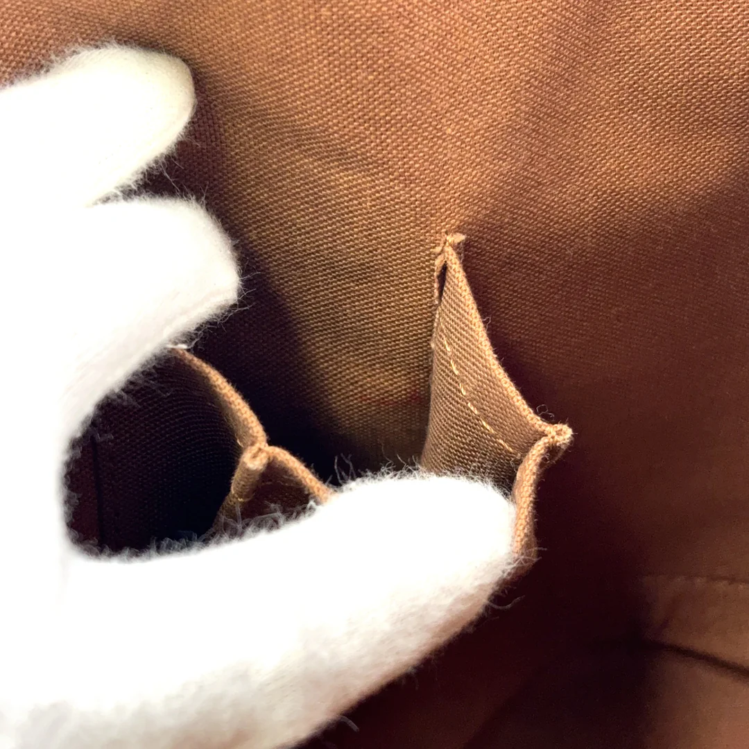 Louis Vuitton Alma Handbag