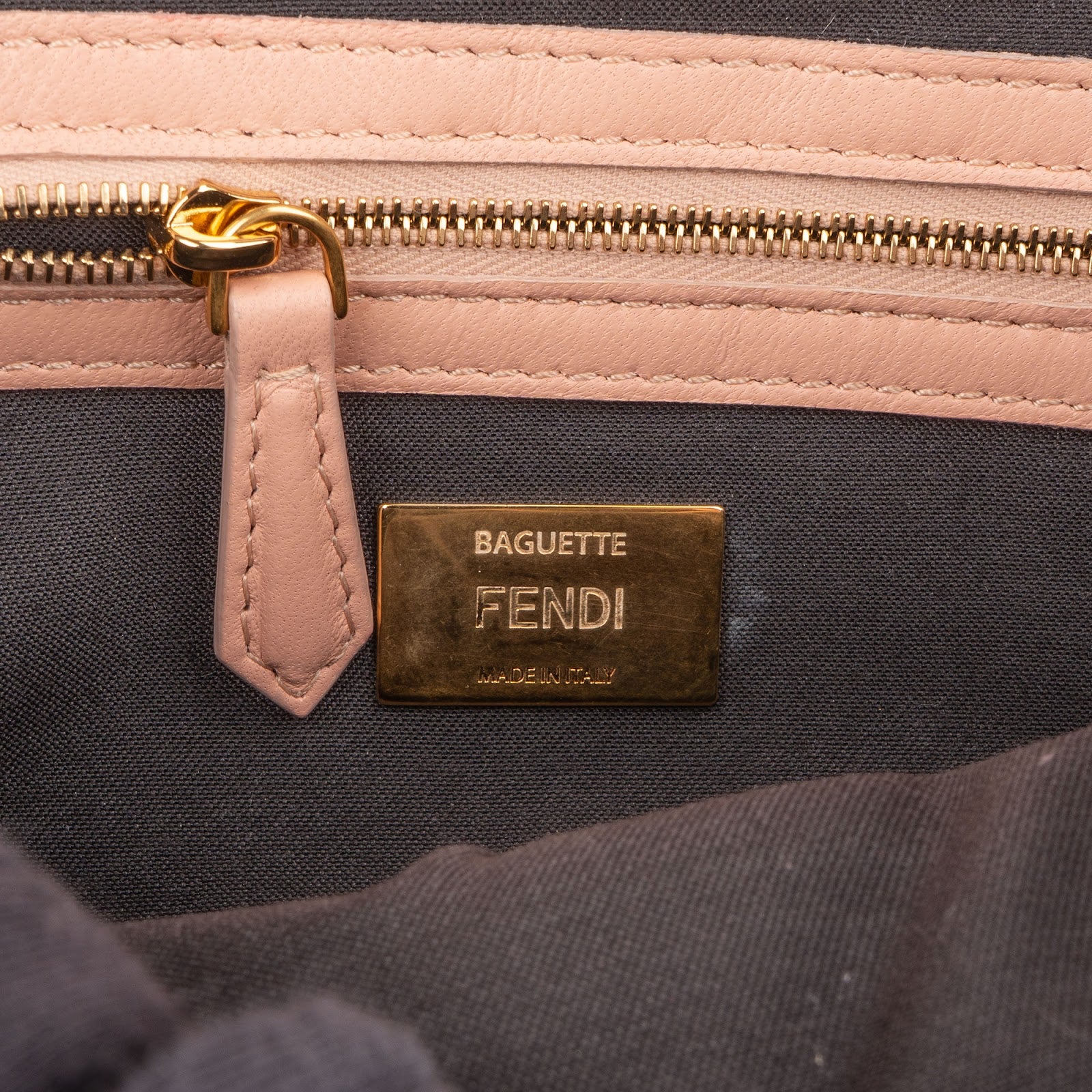 Fendi – Baguette Embossed Monogram FF Crossbody Bag