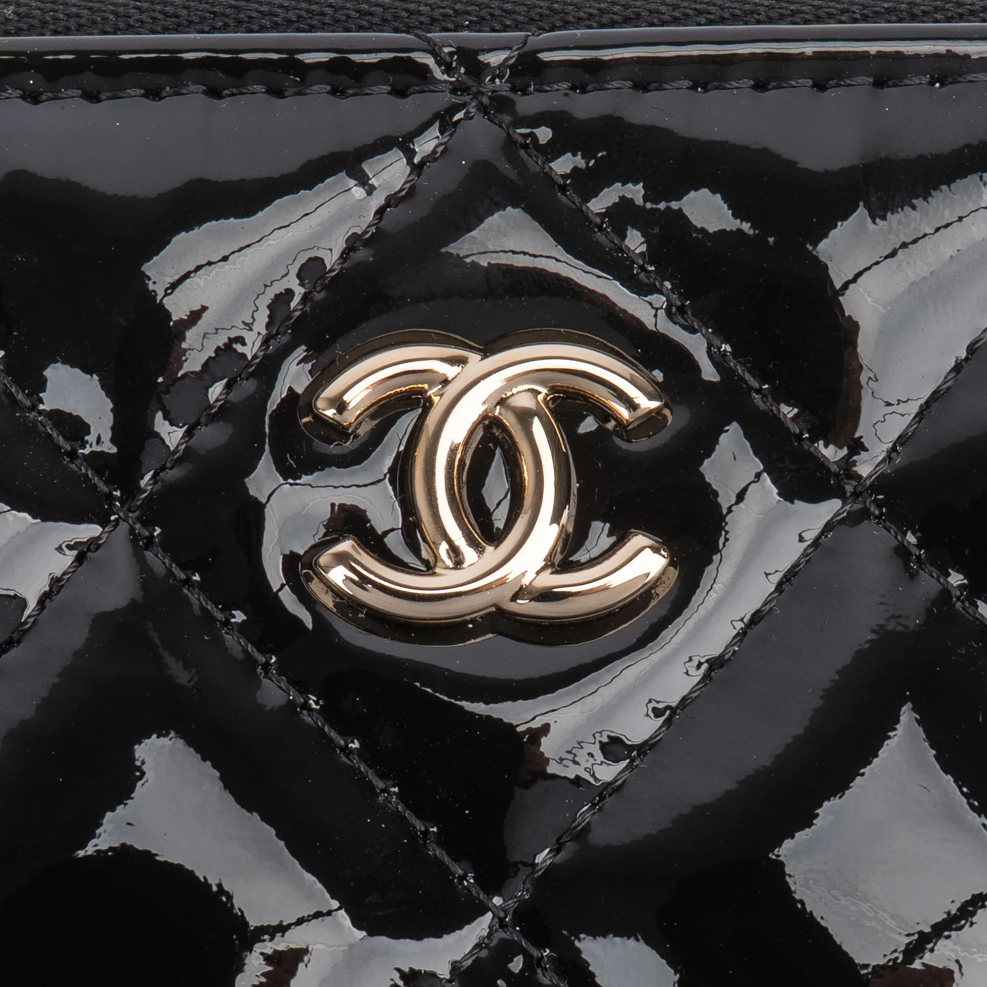 Chanel Quilted Patent Leather CC Clutch