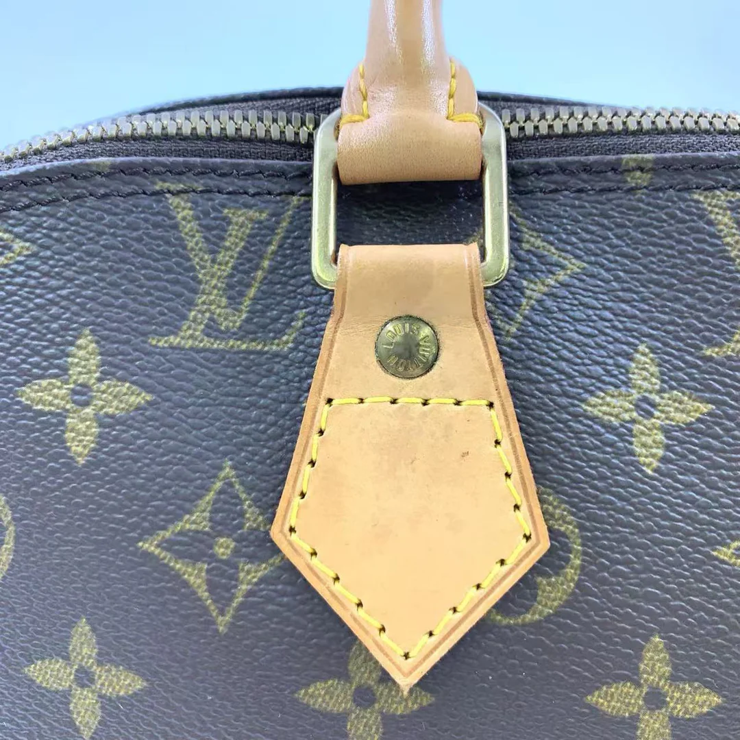 Louis Vuitton Alma Handbag