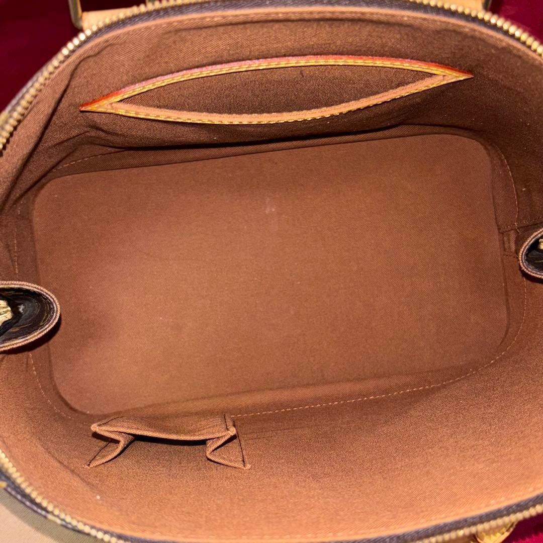 Louis Vuitton Alma Handbag