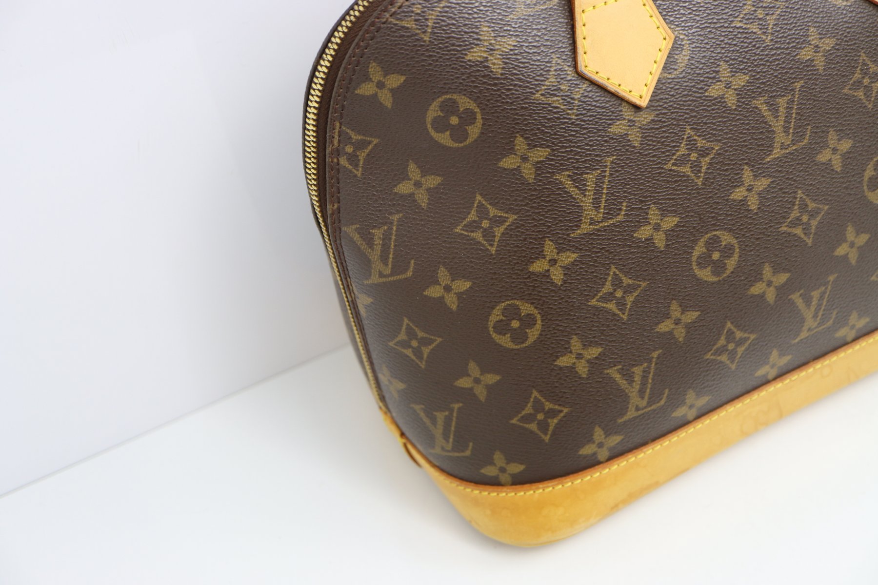 Louis Vuitton Canvas Monogram Alma Handbag