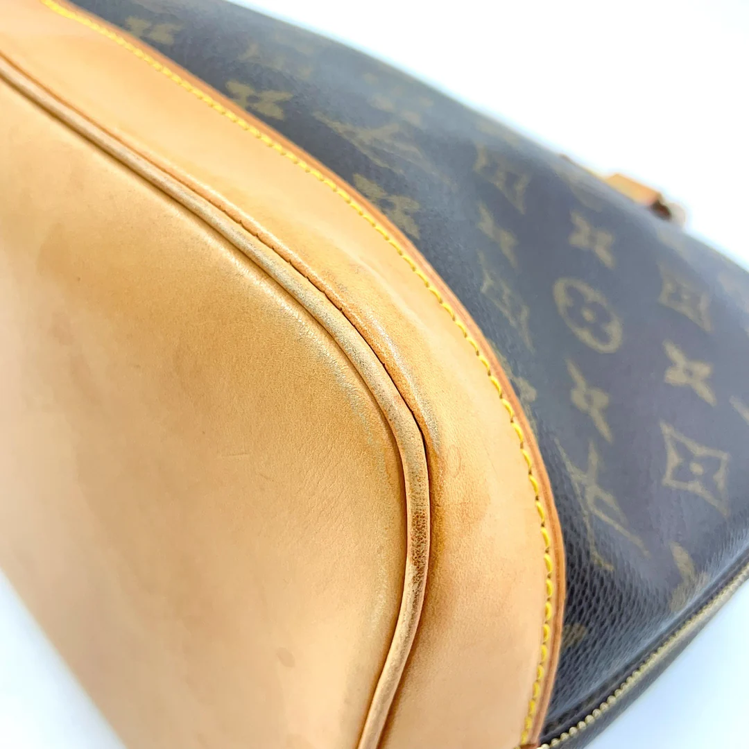 Louis Vuitton Alma Handbag
