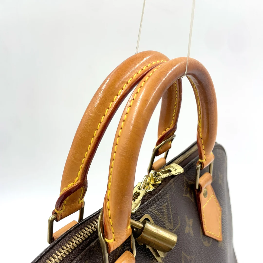 Louis Vuitton Alma Handbag