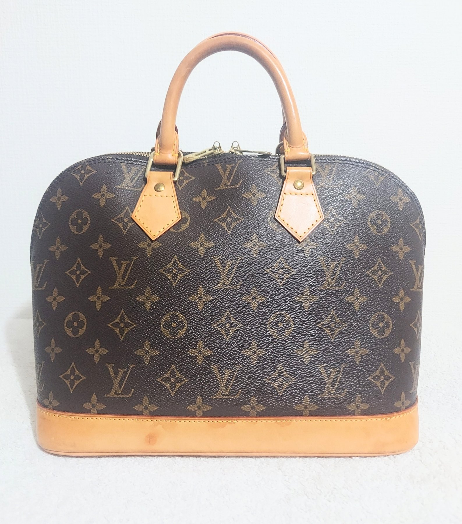 Louis Vuitton Alma Handbag