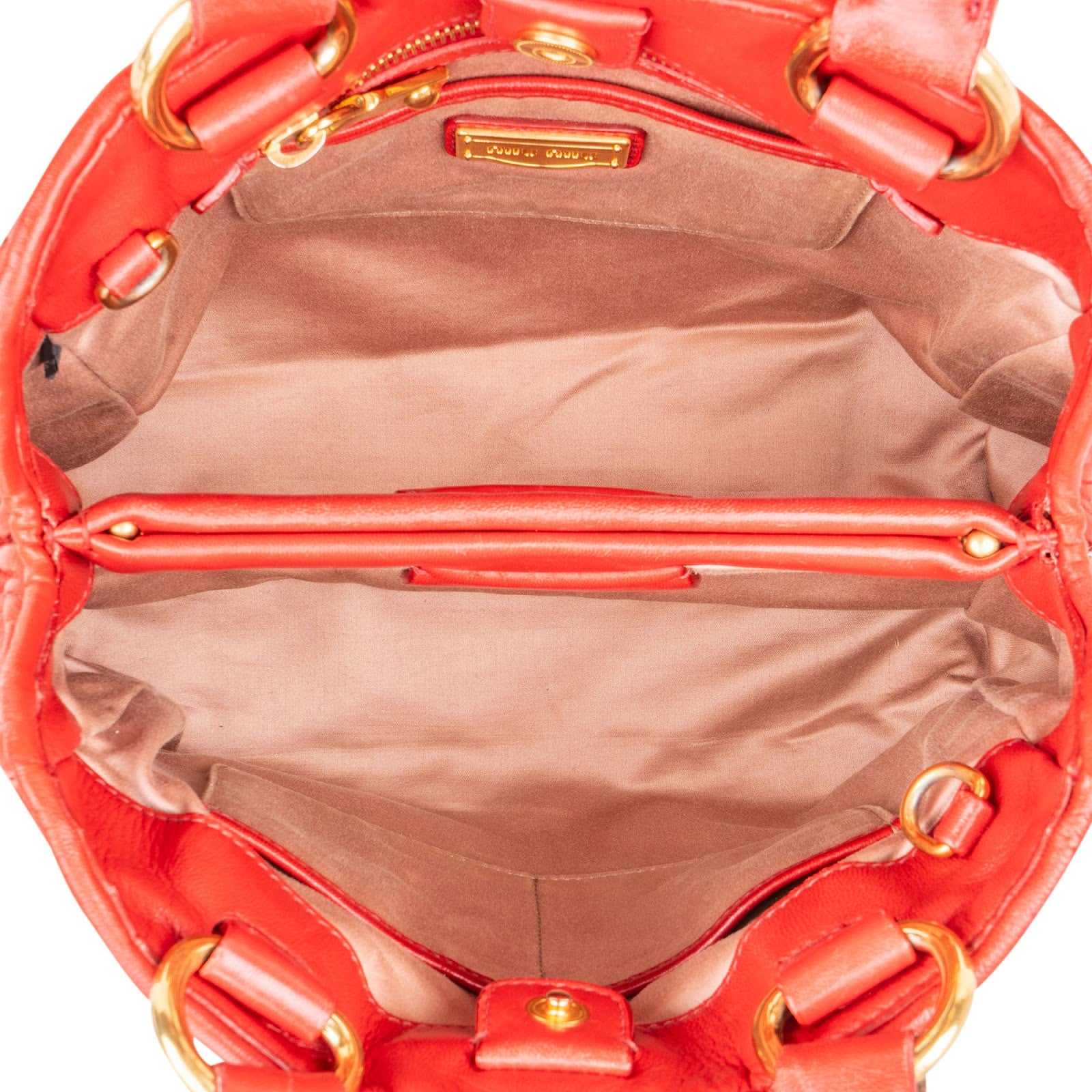 Petit sac à main Miu Miu en cuir nappa matelassé avec poignée sur le dessus