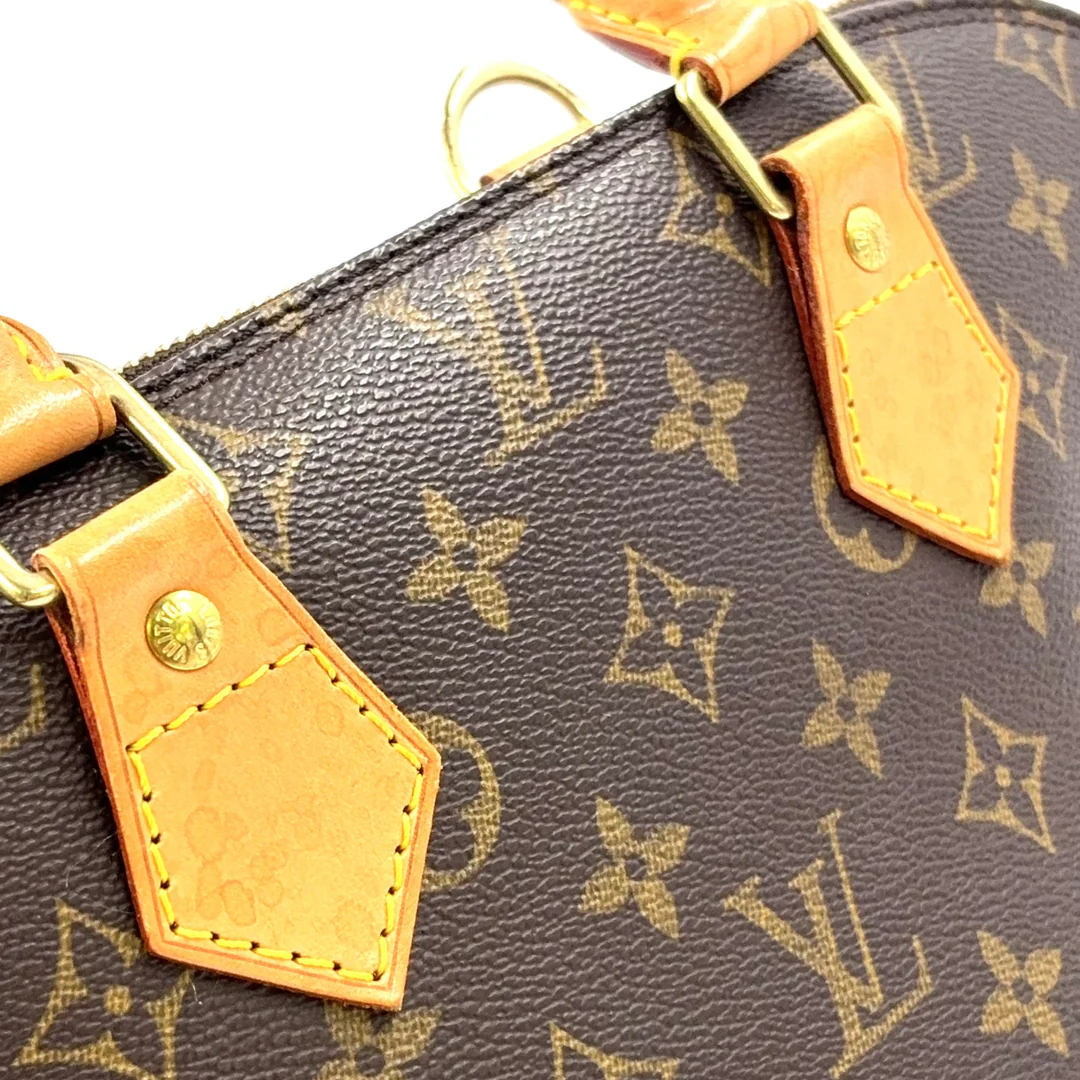 Louis Vuitton Alma Handbag