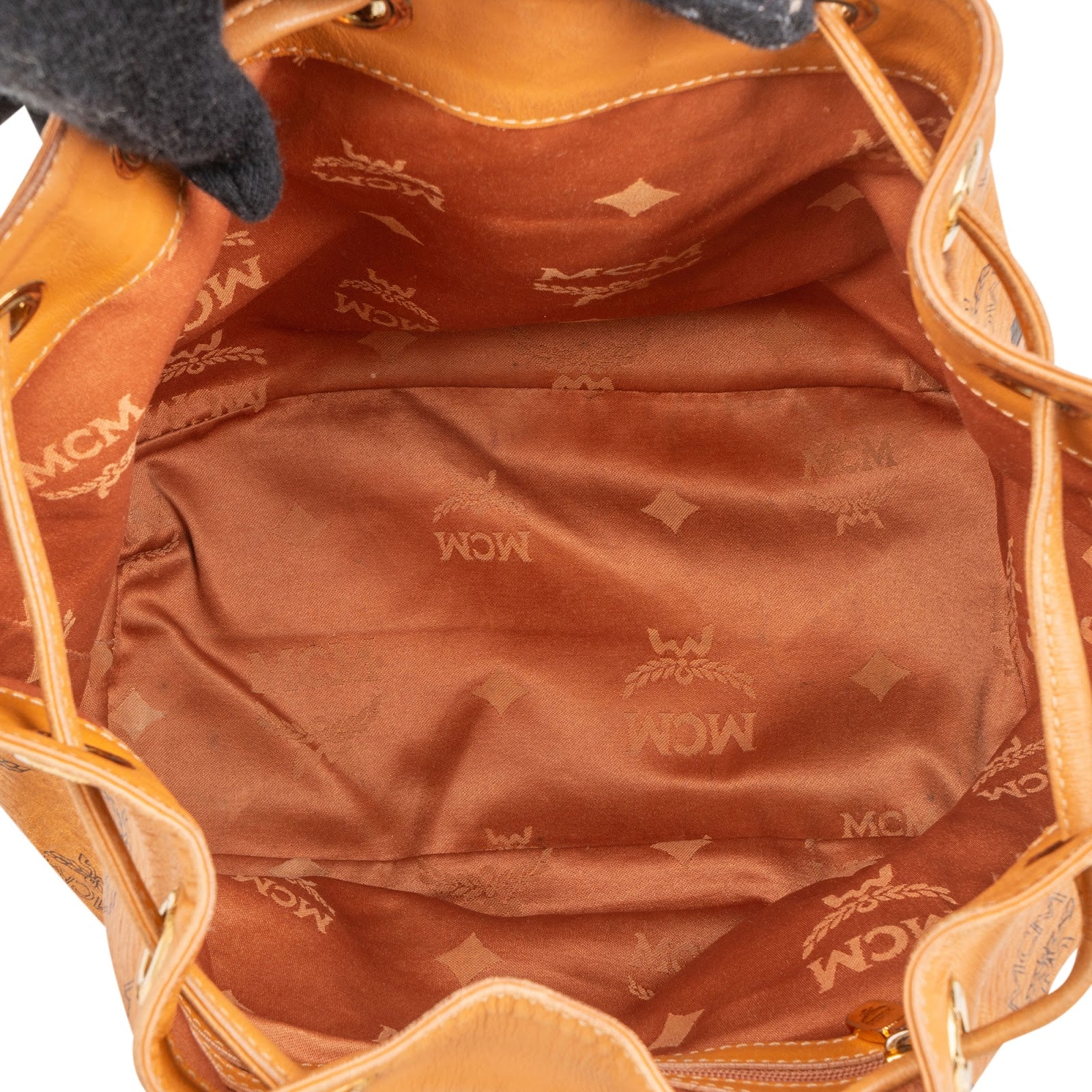 Sac à bandoulière type « bucket » MCM à cordon de serrage, motif Monogram Visetos