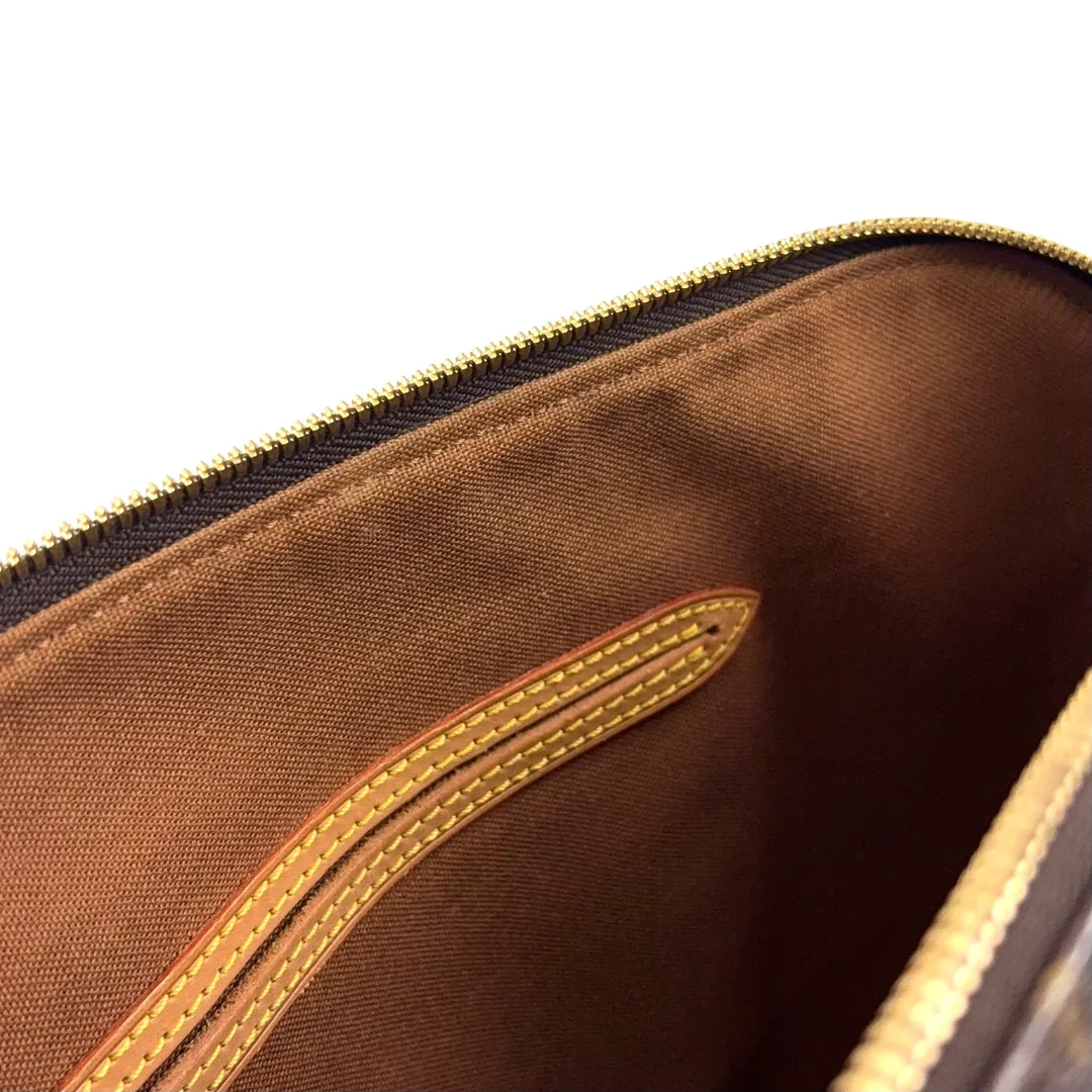 Louis Vuitton Alma Handbag