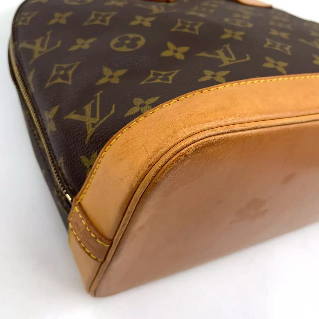 Louis Vuitton Alma Handbag