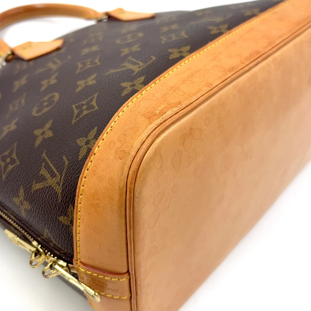 Louis Vuitton Alma Handbag