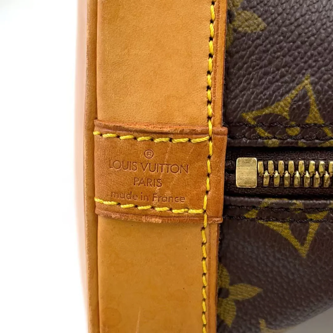 Louis Vuitton Alma Handbag