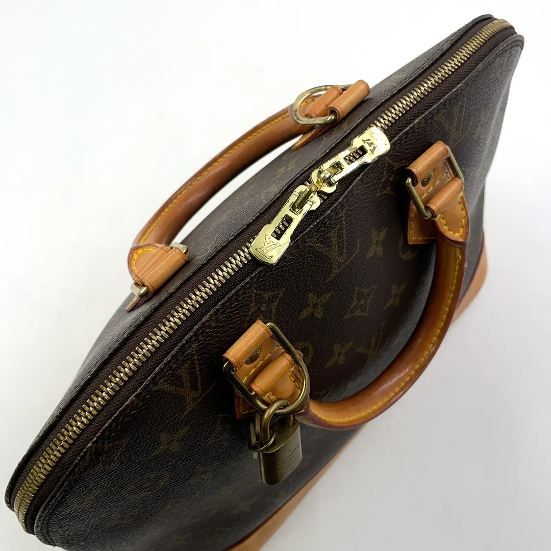 Louis Vuitton Alma Handbag