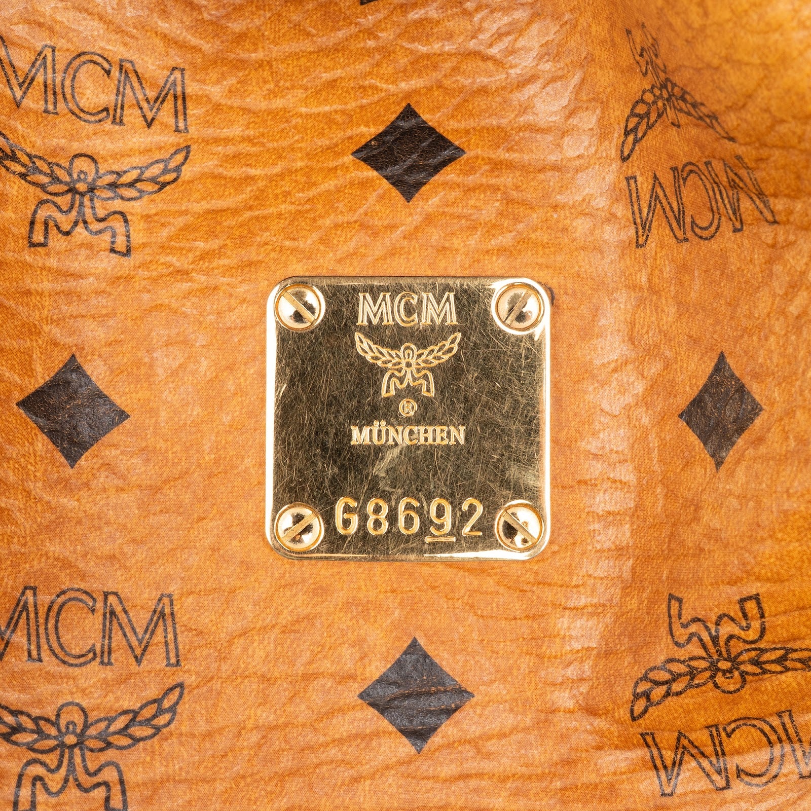 Sac à bandoulière type « bucket » MCM à cordon de serrage, motif Monogram Visetos
