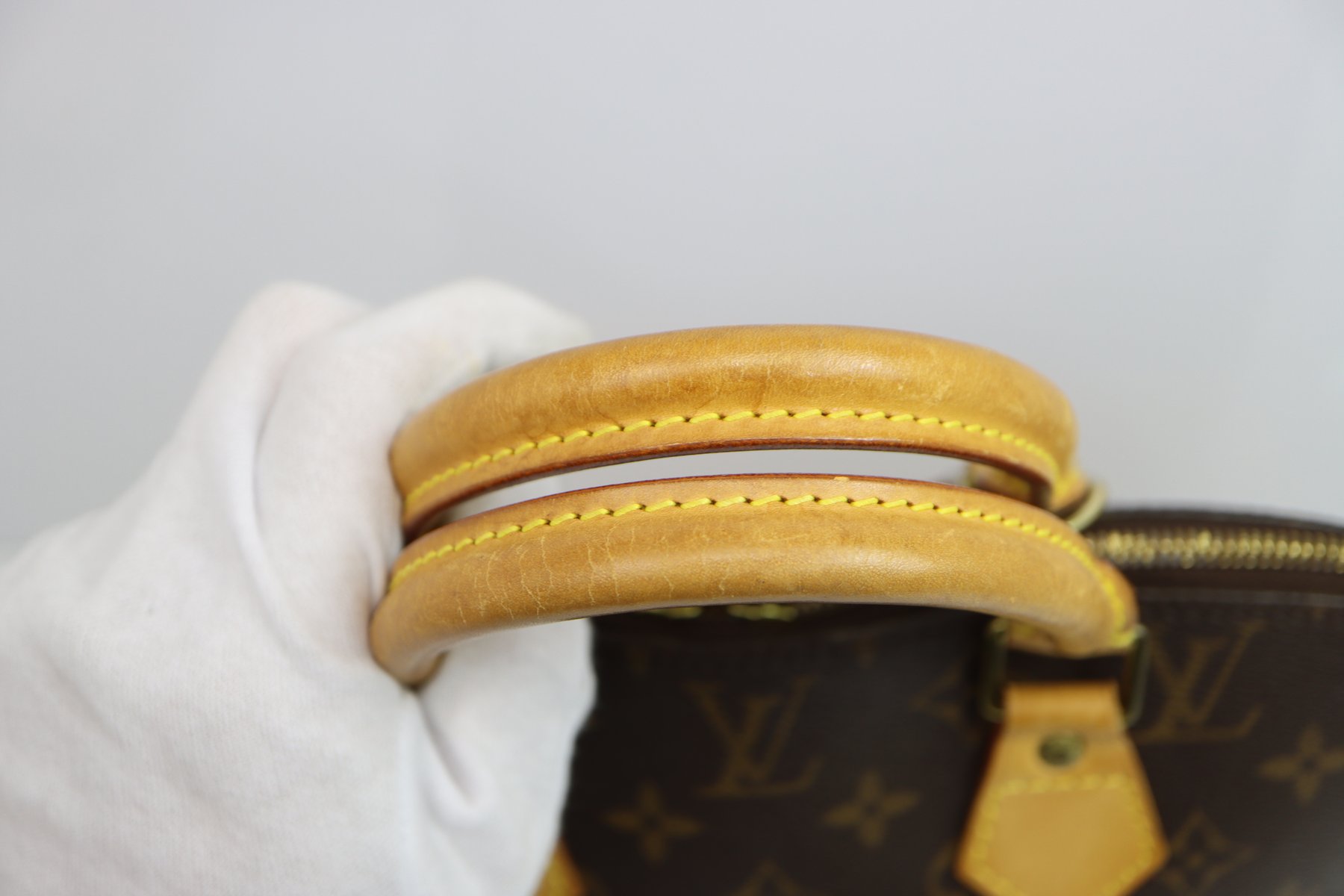 Louis Vuitton Canvas Monogram Alma Handbag