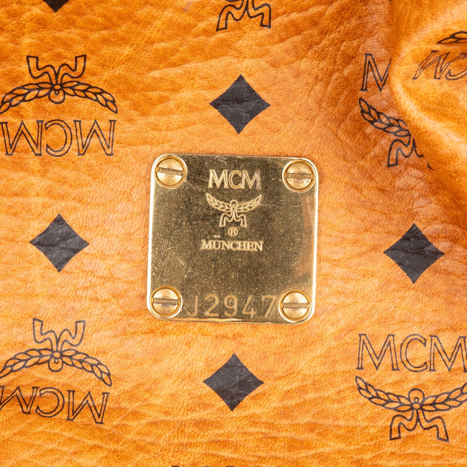 Sac à bandoulière type « bucket » MCM à cordon de serrage, motif Monogram Visetos
