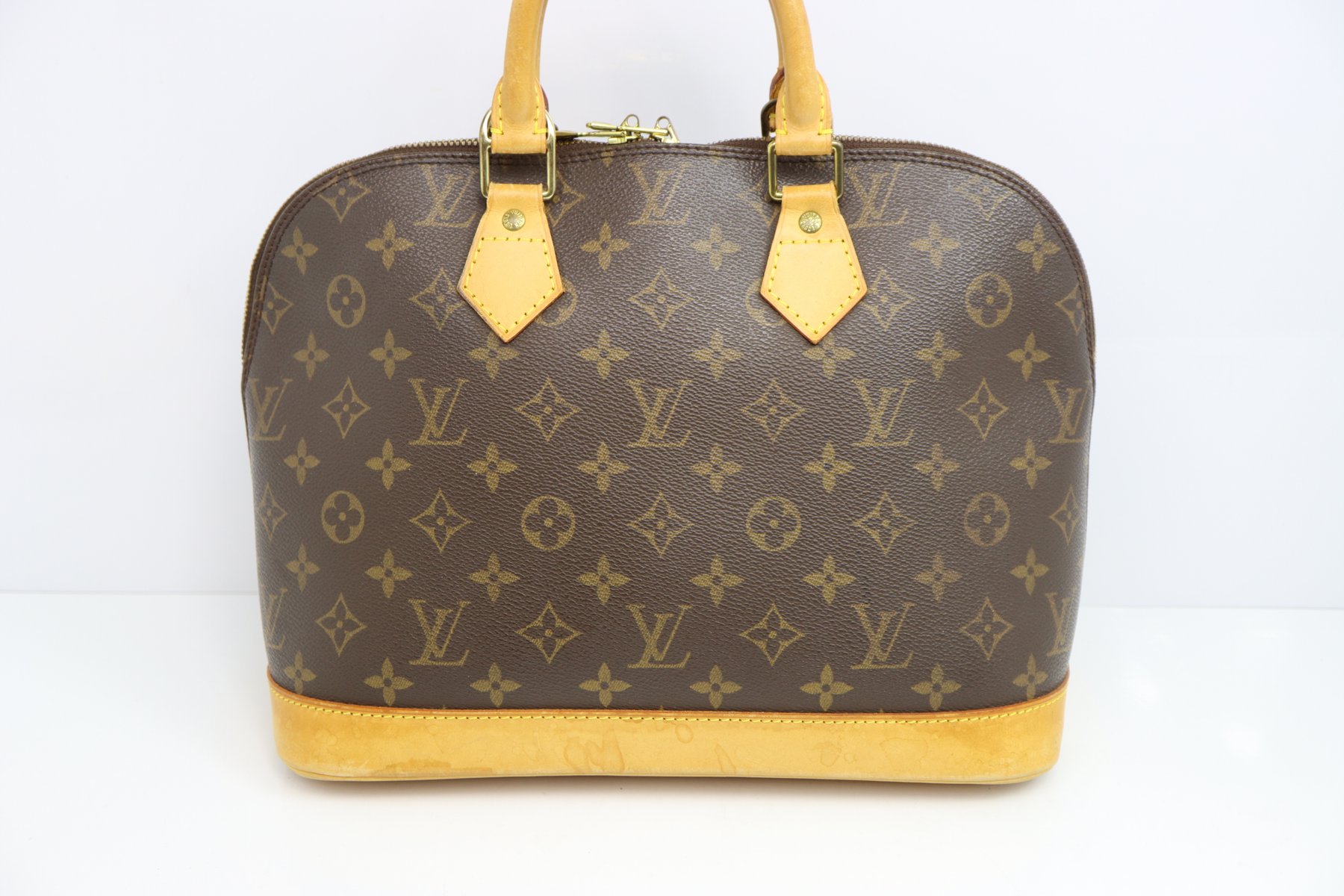 Louis Vuitton Canvas Monogram Alma Handbag
