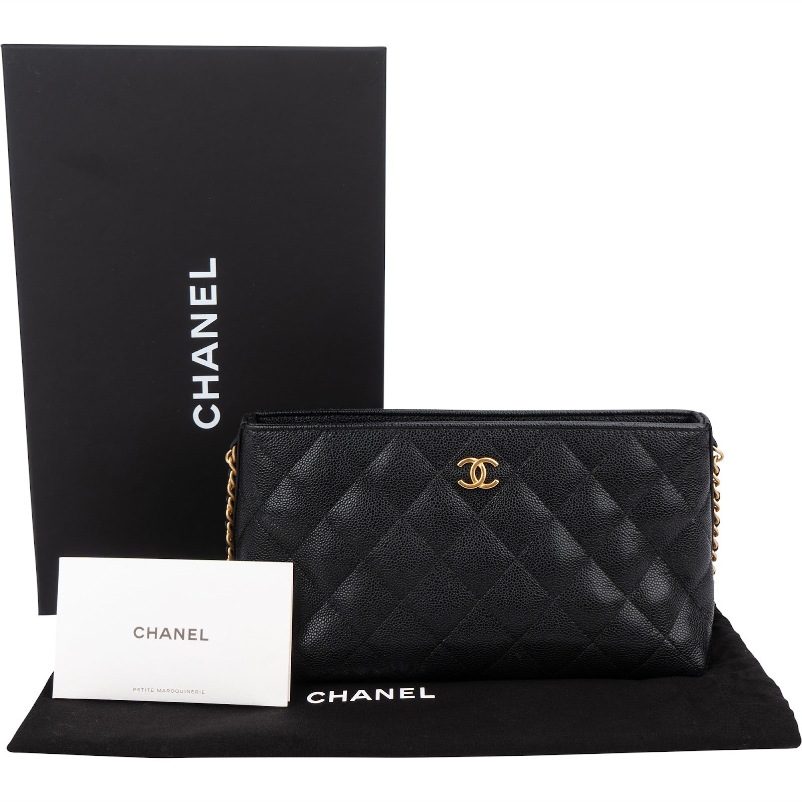 Pochette Chanel in pelle Caviar trapuntata con catena laterale