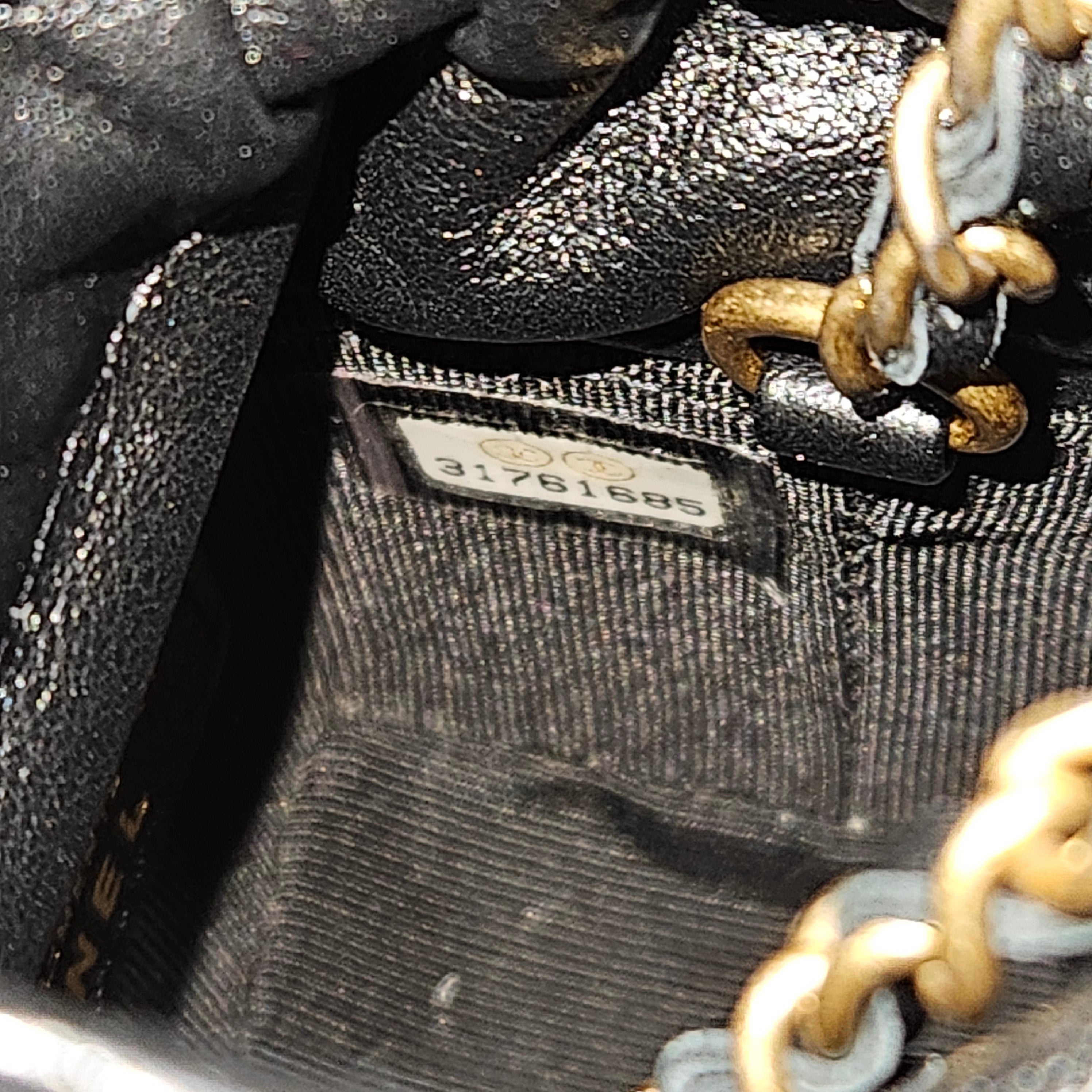 Chanel Quilted Leather Micro Cube Crossbody Bag
