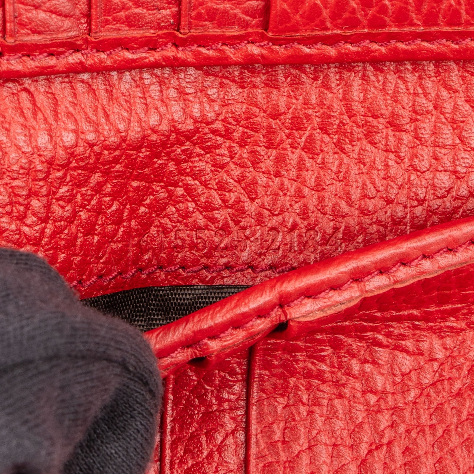 Gucci Pebbled Leather Interlocking G Compact Wallet