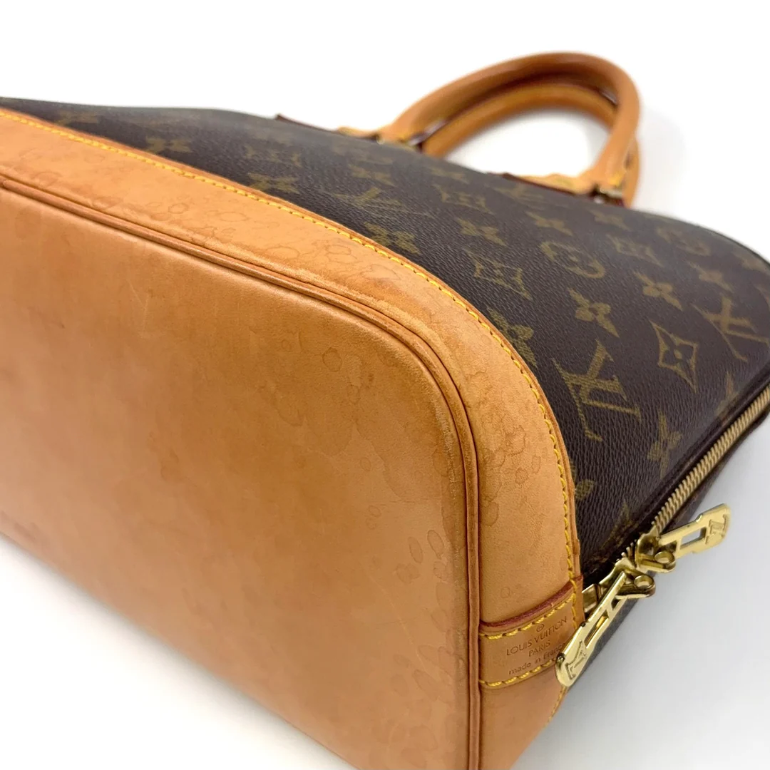 Louis Vuitton Alma Handbag
