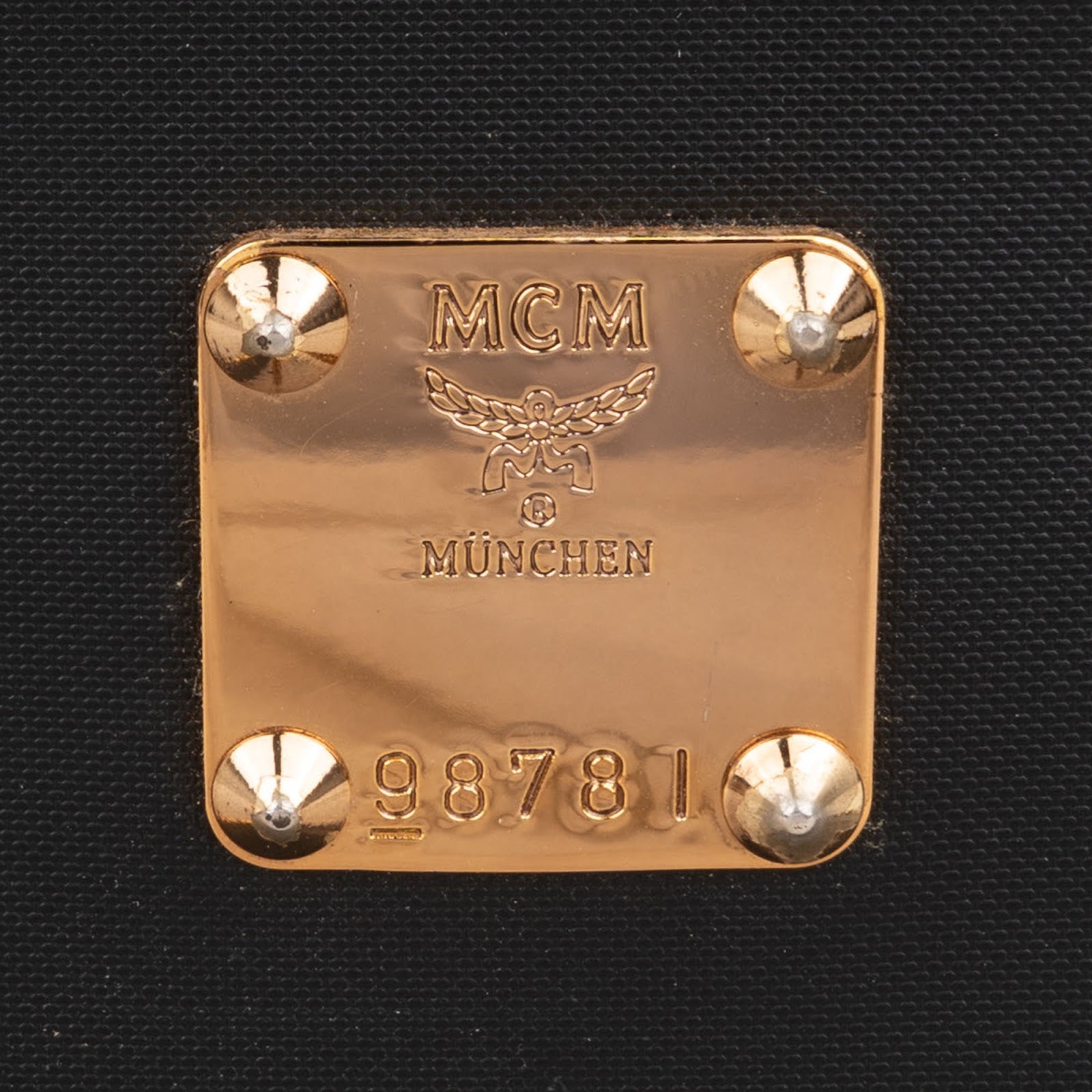 MCM - Kleine, met studs versierde make-upkoffer