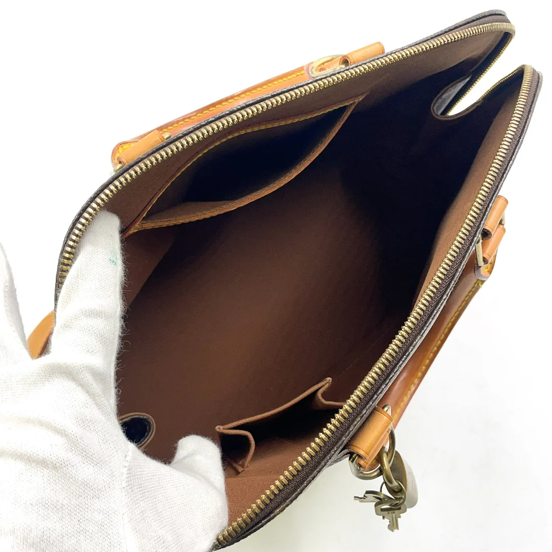 Louis Vuitton Alma Handbag
