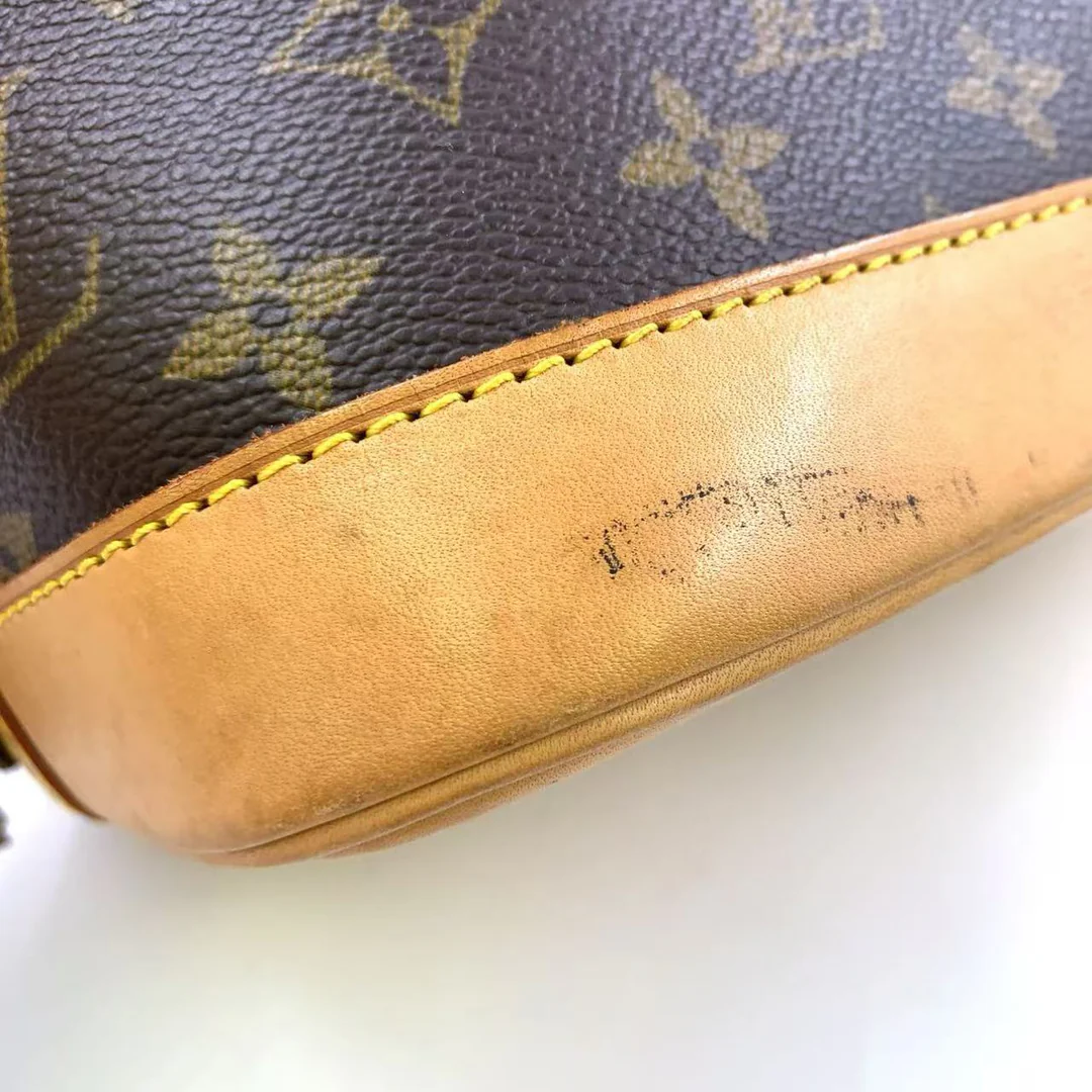 Louis Vuitton Alma Handbag