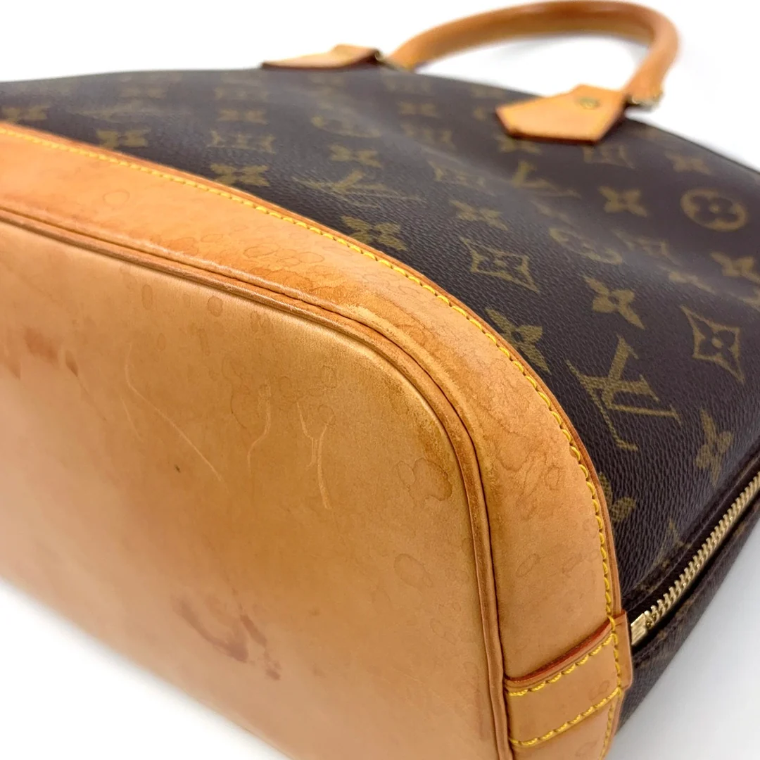 Louis Vuitton Alma Handbag