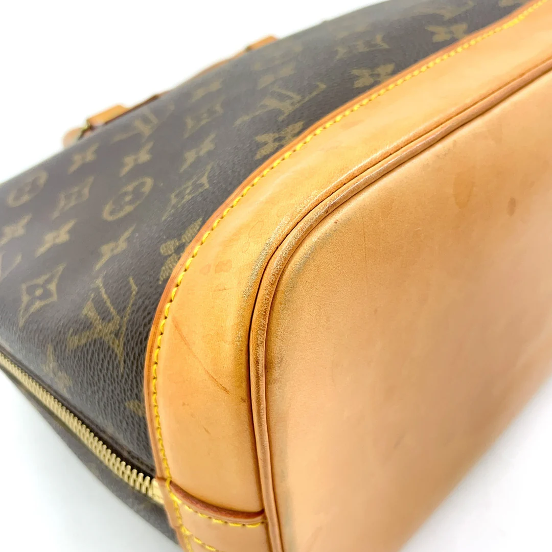 Louis Vuitton Alma Handbag